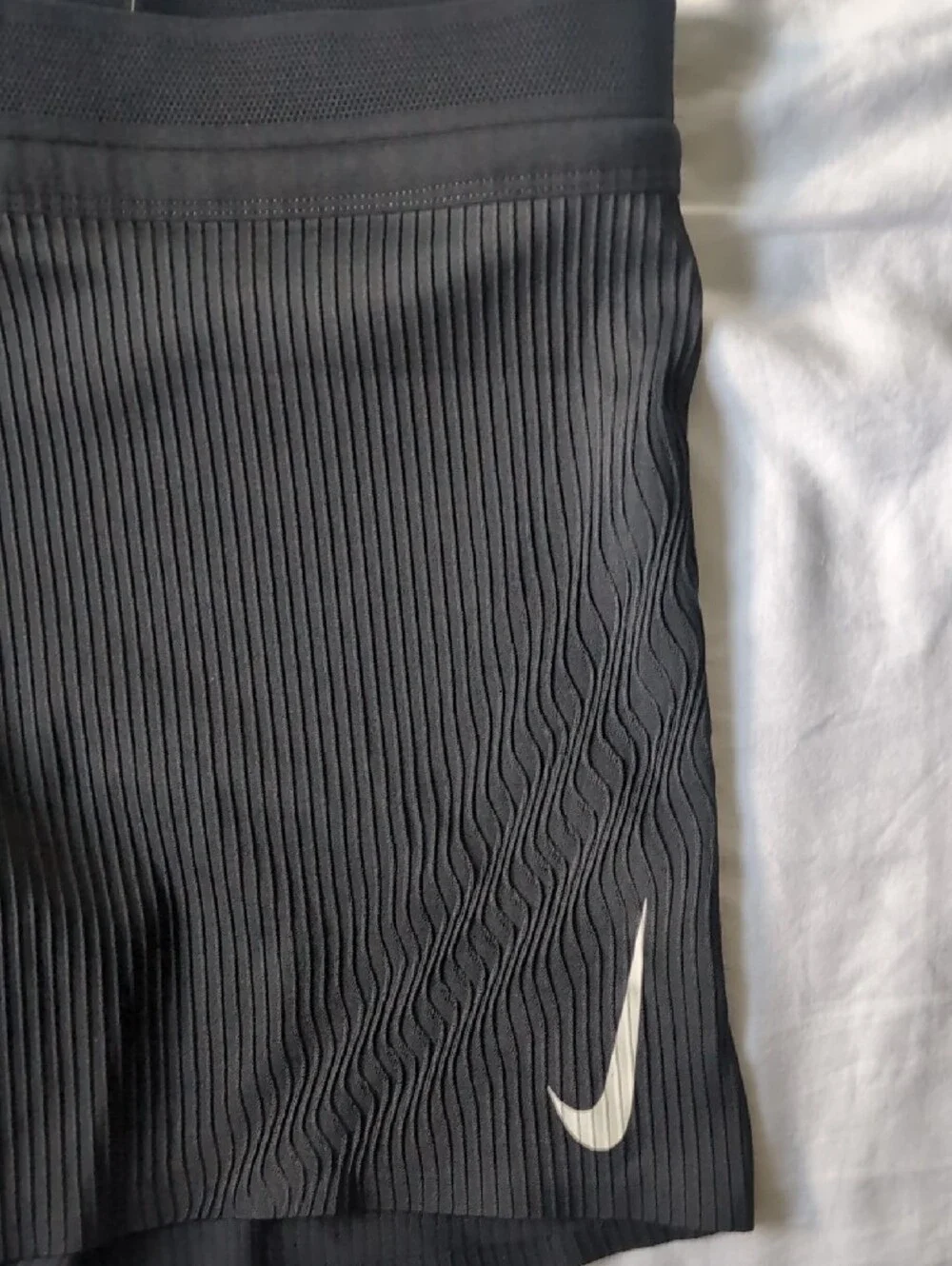 Nike Women’s Black Textured Athletic Shorts with White Swooshes